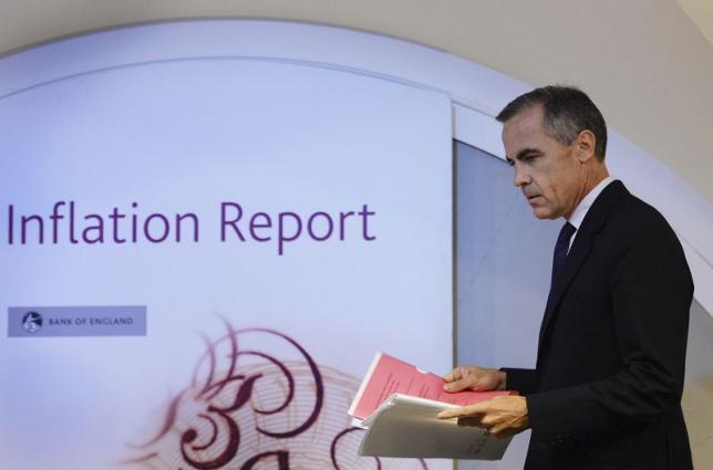 Bank of England Governor Mark Carney arrives to present the bank's quarterly inflation report news conference at the Bank of England in London