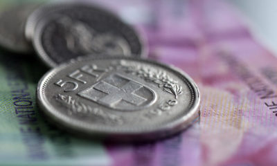 Swiss Coins And Banknotes As The Swiss Franc Weakens Against Dollar
