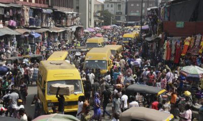 pedestrians-shop-in-balogun-market-in-lagos-nigeria-on-dec-23-photo-sunday-alambaassociated-press